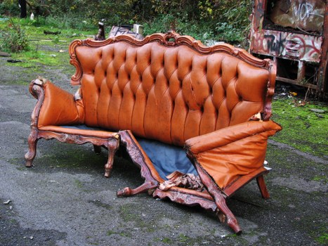 Company vehicle collecting commercial waste at a business premises